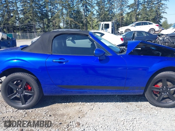 2006 Mazda MX-5 Miata Touring z VIN JM1NC25F560104482, wystawiony jako IAAI lot #42045035 z przebiegiem 131 892 mil mil oraz . Historia ofert i sprzedaży dostępna na DreamBid. Obrazek 14.