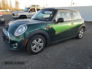 2014 MINI Hardtop with VIN WMWXM5C52ET935398, listed as a Copart auction lot 83096224 with 80,661 mi miles and Salvage Title. Bid and sale history available at DreamBid. Image 1.