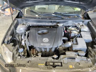 2016 Mazda CX-3 Grand Touring z VIN JM1DKFD74G0137815, wystawiony jako Copart lot #52405765 z przebiegiem 128 922 mil mil oraz Szkoda całkowita • Salvage title. Historia ofert i sprzedaży dostępna na DreamBid. Obrazek 11.