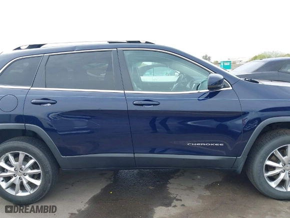 2014 Jeep Cherokee Limited with VIN 1C4PJMDS3EW121849, listed as a IAAI auction lot 41713331 with NaN miles. Bid and sale history available at carsss.com. Image 13.
