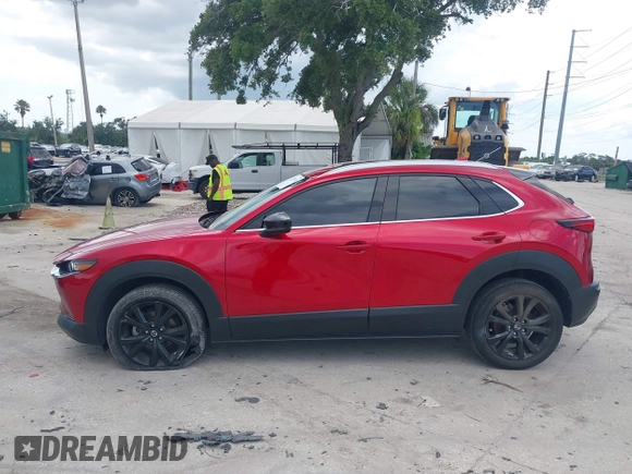 2023 Mazda CX-30 Premium с VIN 3MVDMBDY3PM507398, выставлен на аукционе IAAI как лот 42533176 с пробегом 15 788 миль миль и . История ставок и продаж доступна на DreamBid. Изображение 14.