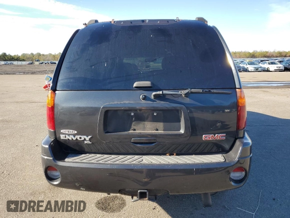 2004 GMC Envoy XL SLE with VIN 1GKET16S046147177, listed as a Copart auction lot 87014444 with 171,040 mi miles and Salvage Title. Bid and sale history available at carsss.com. Image 6.