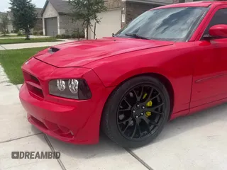 2007 Dodge Charger SRT-8 с VIN 2B3LA73W37H669857, выставлен на аукционе Copart как лот 65774425 с пробегом 169 940 миль миль и Чистый • Clean title. История ставок и продаж доступна на DreamBid. Изображение 15.