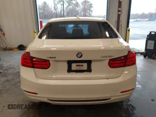 2014 BMW 3 Series 328i xDrive with VIN WBA3B5C53EP543964, listed as a IAAI auction lot 41856923 with 149,440 mi miles. Bid and sale history available at carsss.com. Image 16.
