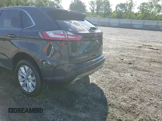 2021 Ford Edge Titanium z VIN 2FMPK3K96MBA54764, wystawiony jako Copart lot #55593715 z przebiegiem 49 729 mil mil oraz Szkoda całkowita • Salvage title. Historia ofert i sprzedaży dostępna na DreamBid. Obrazek 13.