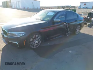 2018 BMW 5 Series M550i xDrive with VIN WBAJB9C59JG463948, listed as a IAAI auction lot 41845989 with 99,385 mi miles. Bid and sale history available at carsss.com. Image 17.