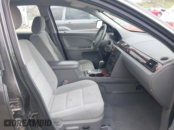 2007 Ford Five Hundred SEL z VIN 1FAHP24157G102902, wystawiony jako IAAI lot #42123329 z przebiegiem 105 468 mil mil oraz . Historia ofert i sprzedaży dostępna na DreamBid. Obrazek 5.