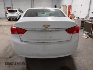 2018 Chevrolet Impala LT with VIN 1G1105S39JU135781, listed as a IAAI auction lot 41813394 with 100,747 mi miles and . Bid and sale history available at DreamBid. Image 16.