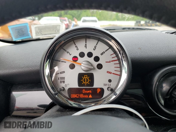 2012 MINI Hardtop with VIN WMWSU3C51CT259005, listed as a Copart auction lot 60710015 with 84,218 mi miles and Salvage title. Bid and sale history available at DreamBid. Image 9.