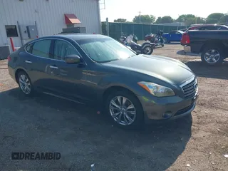 2013 Infiniti M with VIN JN1BY1AR5DM603855, listed as a IAAI auction lot 42454181 with 130,409 mi miles and . Bid and sale history available at DreamBid. Image 1.