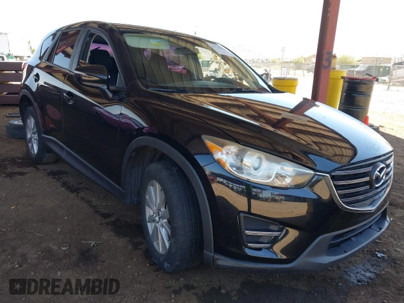 2016 Mazda CX-5 Sport with VIN JM3KE4BY8G0829002, listed as a IAAI auction lot 42553846 with 103,231 mi miles and . Bid and sale history available at DreamBid. Image 1.