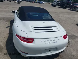 2014 Porsche 911 Carrera S z VIN WP0CB2A97ES154099, wystawiony jako IAAI lot #42264557 z przebiegiem 89 991 mil mil oraz . Historia ofert i sprzedaży dostępna na DreamBid. Obrazek 16.