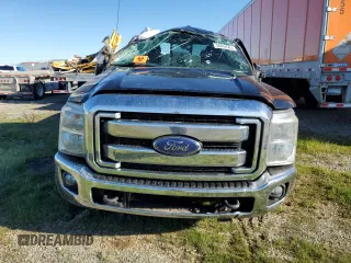 2014 Ford F-350 XLT with VIN 1FT8W3BT2EEA54050, listed as a Copart auction lot 50062505 with 142,252 mi miles and Salvage title. Bid and sale history available at DreamBid. Image 5.