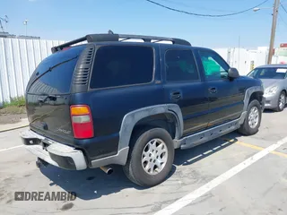 2001 Chevrolet Tahoe LT with VIN 1GNEK13T41R197657, listed as a IAAI auction lot 42164367 with 200,507 mi miles. Bid and sale history available at carsss.com. Image 4.