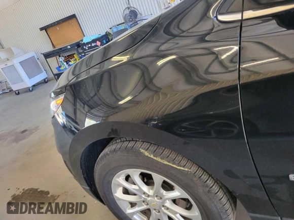 2020 Chevrolet Equinox LT z VIN 2GNAXJEV5L6233921, wystawiony jako IAAI lot #42466454 z przebiegiem 64 667 mil mil oraz . Historia ofert i sprzedaży dostępna na DreamBid. Obrazek 13.