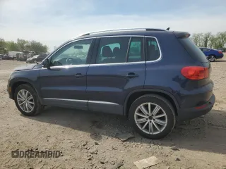2012 Volkswagen Tiguan S with VIN WVGBV7AX1CW561870, listed as a Copart auction lot 53932255 with 105,972 mi miles and Salvage Title. Bid and sale history available at DreamBid. Image 2.
