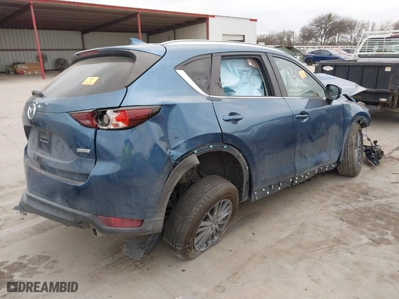2019 Mazda CX-5 Touring with VIN JM3KFACM0K1509957, listed as a IAAI auction lot 41532933 with NaN miles. Bid and sale history available at carsss.com. Image 4.