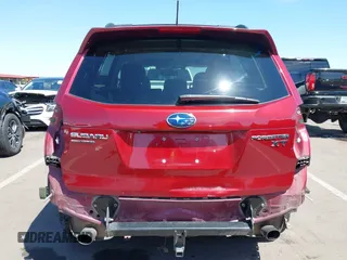 2015 Subaru Forester 2.0XT Touring with VIN JF2SJGWC9FH579887, listed as a IAAI auction lot 41999214 with 147,882 mi miles. Bid and sale history available at carsss.com. Image 6.