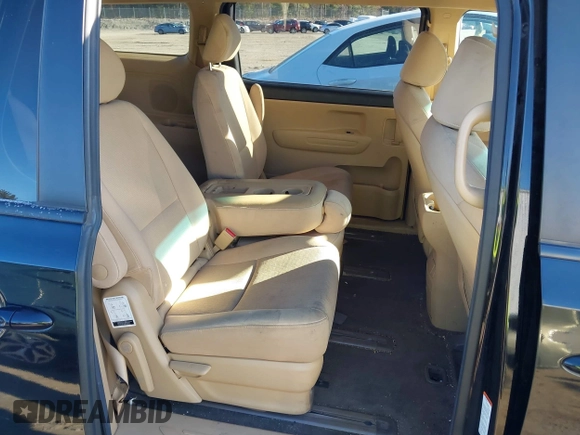 2020 Kia Sedona EX with VIN KNDMB5C17L6587425, listed as a IAAI auction lot 40998825 with 57,503 mi miles. Bid and sale history available at carsss.com. Image 8.