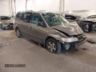 2001 Honda Odyssey EX z VIN 2HKRL18651H010587, wystawiony jako IAAI lot #41381333 z przebiegiem 160 262 mil mil oraz . Historia ofert i sprzedaży dostępna na DreamBid. Obrazek 1.
