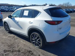 2017 Mazda CX-5 Grand Touring with VIN JM3KFBDL6H0188517, listed as a IAAI auction lot 41093178 with 98,831 mi miles. Bid and sale history available at carsss.com. Image 3.
