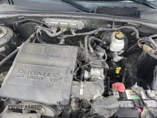 2010 Mercury Mariner Premier with VIN 4M2CN8HG3AKJ16128, listed as a Copart auction lot 58649895 with 157,798 mi miles and Salvage title. Bid and sale history available at DreamBid. Image 12.