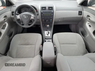 2010 Toyota Corolla with VIN 1NXBU4EE7AZ256666, listed as a Copart auction lot 79097074 with 65,537 mi miles and Salvage title. Bid and sale history available at DreamBid. Image 8.