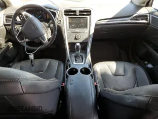 2013 Ford Fusion Titanium Hybrid z VIN 3FA6P0RUXDR376633, wystawiony jako Copart lot #57685555 z przebiegiem 133 248 mil mil oraz Szkoda całkowita • Salvage title. Historia ofert i sprzedaży dostępna na DreamBid. Obrazek 8.