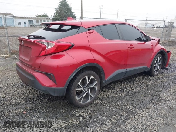 2021 Toyota C-HR LE with VIN JTNKHMBX1M1104530, listed as a IAAI auction lot 41324350 with 53,112 mi miles. Bid and sale history available at carsss.com. Image 4.