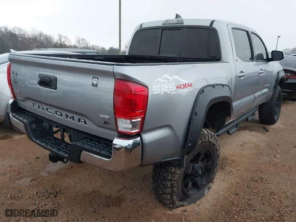 2017 Toyota Tacoma SR5 with VIN 5TFCZ5AN7HX080023, listed as a IAAI auction lot 41694844 with 79,295 mi miles. Bid and sale history available at carsss.com. Image 4.