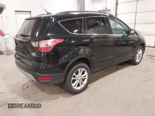 2017 Ford Escape SE with VIN 1FMCU9G98HUD67920, listed as a IAAI auction lot 40937291 with 124,302 mi miles. Bid and sale history available at carsss.com. Image 4.