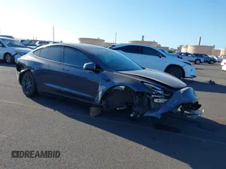 2021 Tesla Model 3 Standard Range Plus z VIN 5YJ3E1EA0MF850935, wystawiony jako IAAI lot #41635100 z przebiegiem 44 050 mil mil oraz . Historia ofert i sprzedaży dostępna na DreamBid. Obrazek 1.