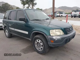 2000 Honda CR-V LX z VIN JHLRD2848YC012070, wystawiony jako IAAI lot #42371384 z przebiegiem 233 536 mil mil oraz . Historia ofert i sprzedaży dostępna na DreamBid. Obrazek 1.