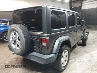2018 Jeep Wrangler Unlimited Sport S with VIN 1C4HJXDG5JW126496, listed as a IAAI auction lot 42390584 with 163,476 mi miles and . Bid and sale history available at DreamBid. Image 4.