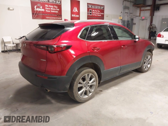2021 Mazda CX-30 Premium with VIN 3MVDMADL8MM320149, listed as a IAAI auction lot 41317680 with 47,383 mi miles and . Bid and sale history available at DreamBid. Image 4.
