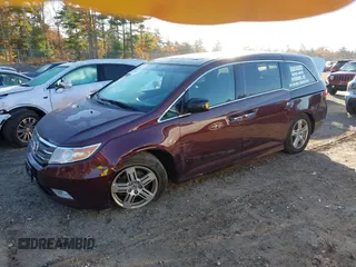 2012 Honda Odyssey Touring z VIN 5FNRL5H9XCB067841, wystawiony jako IAAI lot #40631672 z przebiegiem 210 237 mil mil oraz . Historia ofert i sprzedaży dostępna na DreamBid. Obrazek 2.