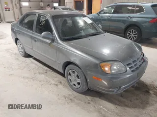 2004 Hyundai Accent GL with VIN KMHCG45C44U528783, listed as a IAAI auction lot 41535104 with 1 mi miles. Bid and sale history available at carsss.com. Image 1.
