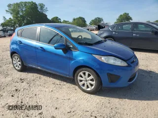 2011 Ford Fiesta SE with VIN 3FADP4EJ8BM141958, listed as a Copart auction lot 54503515 with 146,043 mi miles and Clean Title. Bid and sale history available at carsss.com. Image 4.