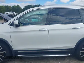 2020 Honda Pilot Elite with VIN 5FNYF6H08LB014288, listed as a IAAI auction lot 40496871 with 57,921 mi miles and . Bid and sale history available at DreamBid. Image 14.