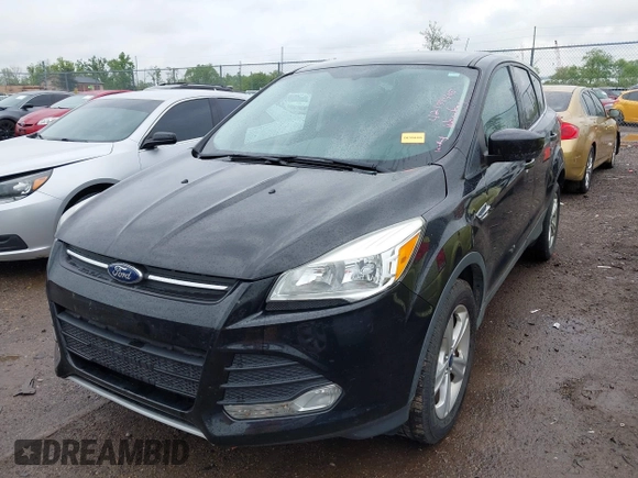 2015 Ford Escape SE with VIN 1FMCU9GX5FUB01864, listed as a IAAI auction lot 42199405 with 114,776 mi miles and . Bid and sale history available at DreamBid. Image 2.