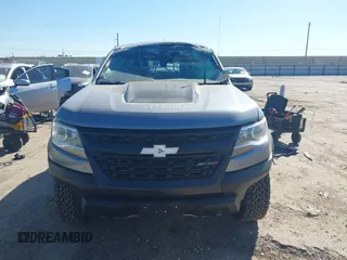 2018 Chevrolet Colorado 4WD ZR2 z VIN 1GCGTEEN0J1115894, wystawiony jako IAAI lot #41774860 z przebiegiem 71 698 mil mil oraz . Historia ofert i sprzedaży dostępna na DreamBid. Obrazek 13.