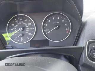 2015 BMW 2 Series 228i with VIN WBA1F5C53FV257086, listed as a IAAI auction lot 40898527 with 83,779 mi miles. Bid and sale history available at carsss.com. Image 7.