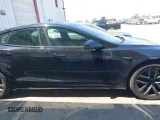 2021 Tesla Model S Long Range z VIN 5YJSA1E54MF429360, wystawiony jako IAAI lot #42662440 z przebiegiem 36 395 mil mil oraz . Historia ofert i sprzedaży dostępna na DreamBid. Obrazek 13.