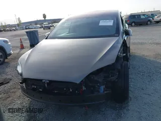 2016 Tesla Model X P90D with VIN 5YJXCAE45GF000773, listed as a IAAI auction lot 42052642 with 127,670 mi miles. Bid and sale history available at carsss.com. Image 13.