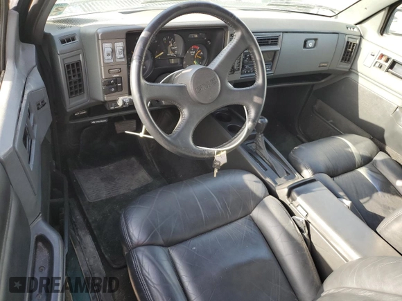 1993 GMC Jimmy z VIN 1GDCT18Z9P0810178, wystawiony jako Copart lot #79442614 z przebiegiem 19 514 mil mil oraz Szkoda całkowita • Salvage title. Historia ofert i sprzedaży dostępna na DreamBid. Obrazek 8.