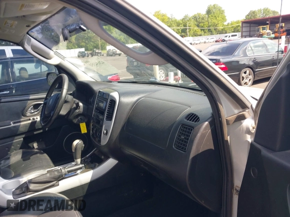 2006 Mercury Mariner Luxury with VIN 4M2YU56106KJ11501, listed as a IAAI auction lot 42634351 with 141,456 mi miles and . Bid and sale history available at DreamBid. Image 5.