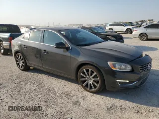2015 Volvo S60 T6 Drive-E with VIN YV149MFK7F1343313, listed as a Copart auction lot 76279894 with 60,091 mi miles and Salvage Title. Bid and sale history available at carsss.com. Image 4.