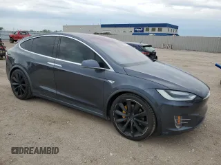 2016 Tesla Model X 70D z VIN 5YJXCAE29GF006512, wystawiony jako Copart lot #57517885 z przebiegiem Nie podano mil oraz Szkoda całkowita • Salvage title. Historia ofert i sprzedaży dostępna na DreamBid. Obrazek 4.