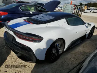 2023 Maserati MC20 z VIN ZAMBMRAB5P0413183, wystawiony jako Copart lot #75189174 z przebiegiem Nie podano mil oraz Nie do naprawy • Non repairable. Historia ofert i sprzedaży dostępna na DreamBid. Obrazek 3.