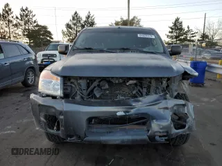 2012 Nissan Titan S with VIN 1N6AA0EC0CN325059, listed as a Copart auction lot 84828374 with 148,856 mi miles and Salvage Title. Bid and sale history available at carsss.com. Image 5.